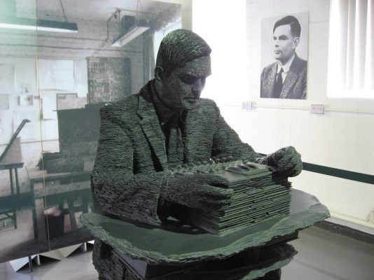 Slate statute of Alan Turing at Bletchley Park.