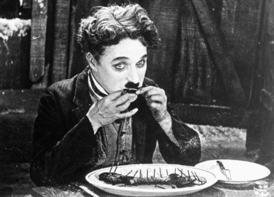 Charlie Chaplin eating a boot, from the film The Gold Rush
