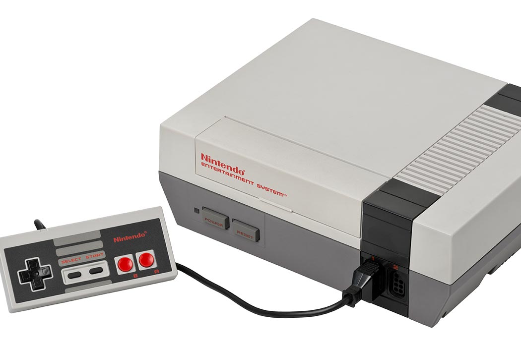 A classic Nintendo Entertainment System complete with the short controller cord