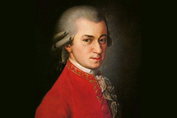 Painting of Mozart wearing a red jacket