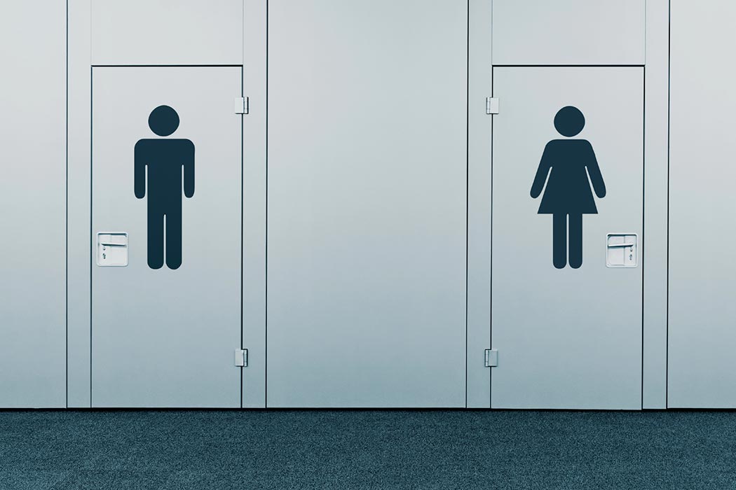 Male and Female symbols on restroom doors