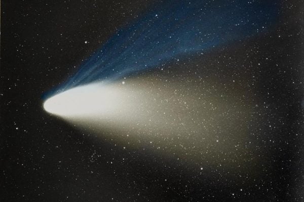 A comet moving through a starry sky