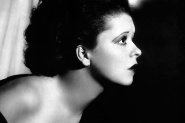 Black and white close-up of Clara Bow in profile