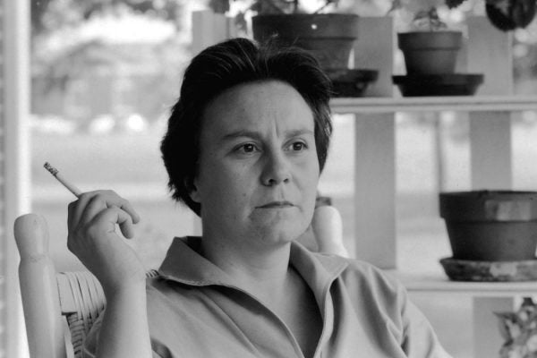 Harper Lee smoking a cigarette in black and white