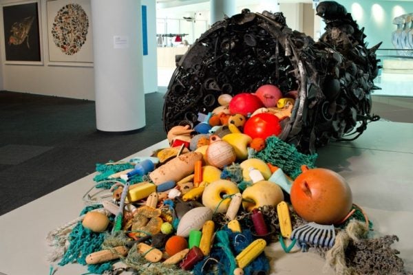 Pam Longobardi sculpture of a cornucopia overflowing with plastic and styrofoam trinkets