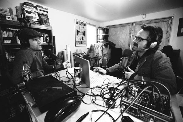 Marc Maron podcasting in his garage.