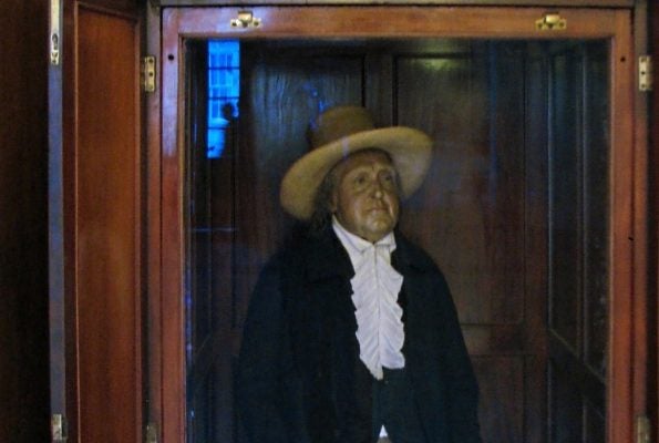 Preserved corpse of Jeremy Bentham in a glass cabinet
