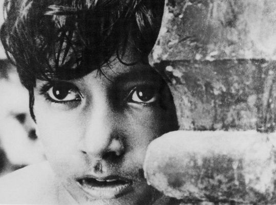 A black and white still from Satyajit Ray’s Apu Trilogy