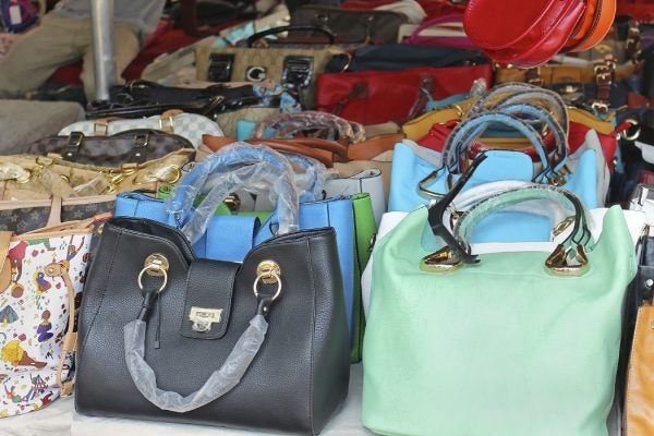 Rows of counterfeit bags in various colors