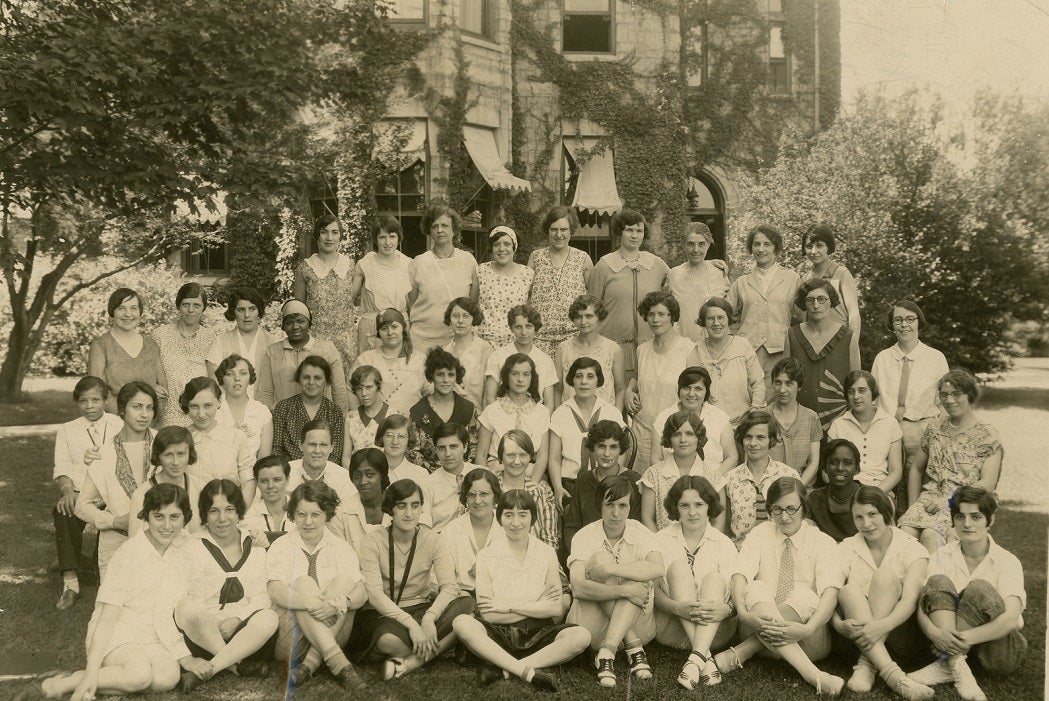 Older black and white photograph of the all female staff at Bryn Mawr summer school