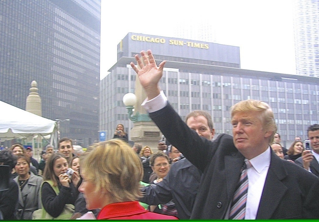 Older photo of Donald Trump waving to the public