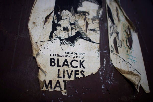 PHILADELPHIA, PA - APRIL 30: A withered poster is seen on the route protestors took to demonstrate over the death of Freddie Gray on April 30, 2015 in Philadelphia, Pennsylvania. Freddie Gray, 25, was arrested for possessing a switch blade knife April 12 outside the Gilmor Houses housing project on Baltimore's west side. According to his attorney, Gray died a week later in the hospital from a severe spinal cord injury he received while in police custody. (Photo by Mark Makela/Getty Images)