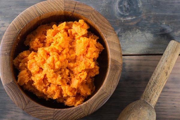 A bowl of mashed sweet potatoes.