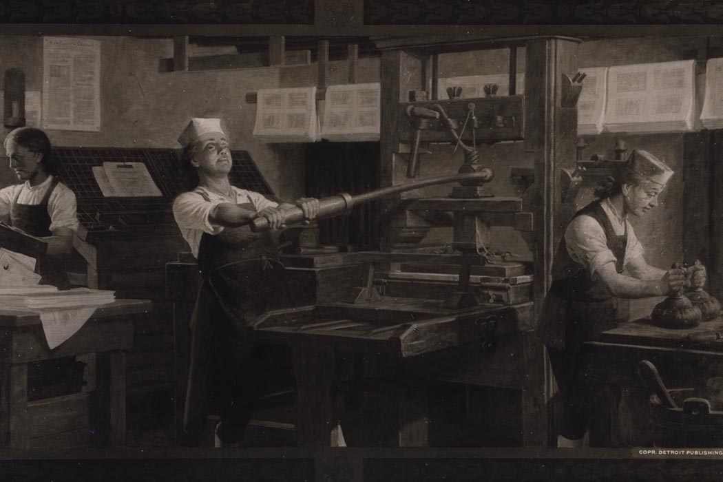 Benjamin Franklin at work on a printing press.