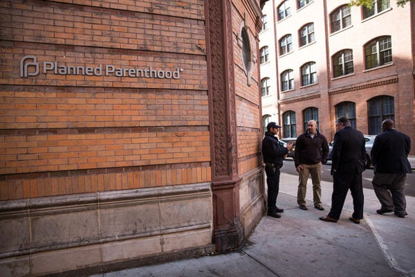 A police officer from the counterterrorism department stands guard outside Planned Parenthood on November 30, 2015 in New York City.