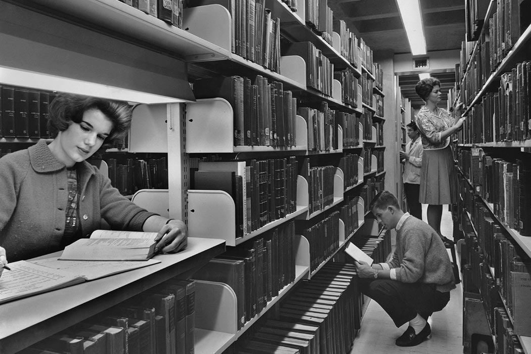 University of Pennsylvania students locate books on the stacks at the new Charles Patterson Van Pelt Library in 1962. (Photo by Authenticated News/Archive Photos)