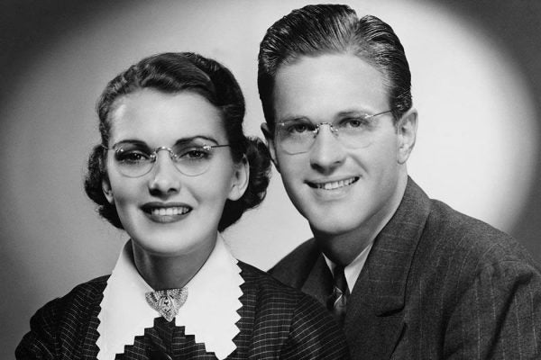 Black and white photo from a couple dressed in 1940s style clothing