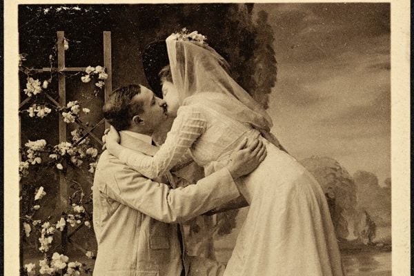An old picture of a Norwegian couple kissing