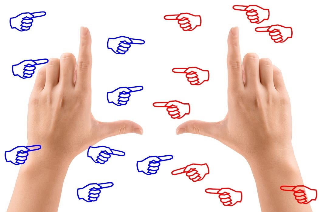 A pair of hands making L's to distinguish which one is actually the left one