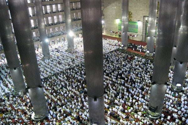 Photograph: Thousands of the Indonesian muslims congregrated during Eid ul Fitr mass prayer in Istiqlal Mosque, the largest mosque in Southeast Asia, located in Central Jakarta, Indonesia.