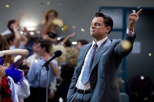 Leonardo DiCaprio as Jordan Belfort celebrating his company in the 2013 film, Wolf of Wall Street