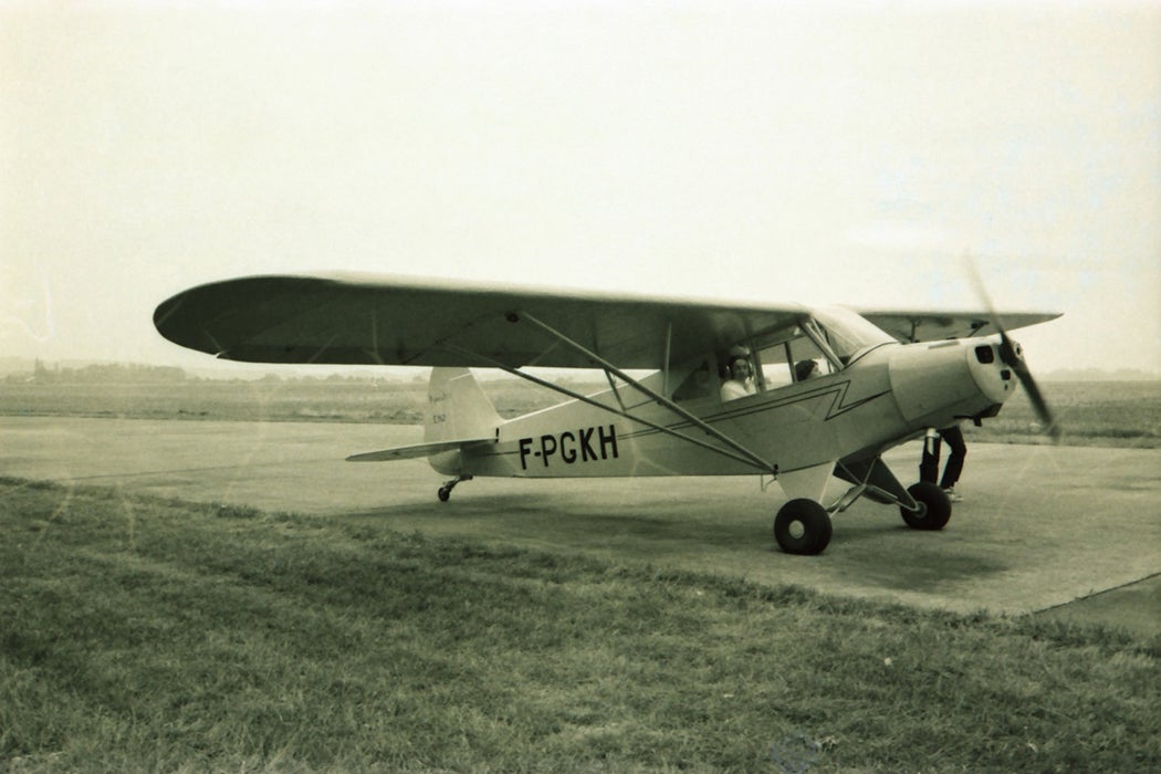 Piper Cub plane farmers
