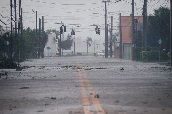Water covers a road leading toward the Halifax River and Daytona Beach after Hurricane Matthew passes through on October 7, 2016 in Daytona Beach, Florida.