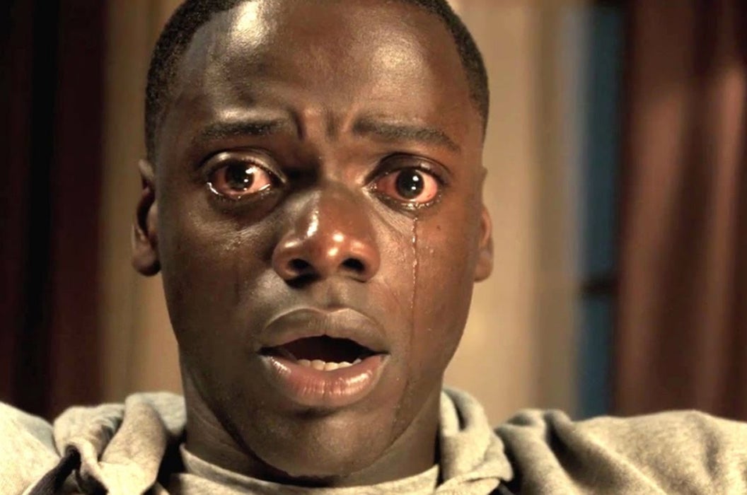 Still from Get Out showing the character Chris crying