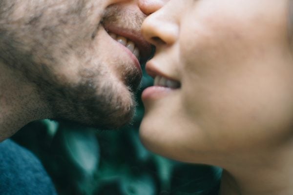 Cropped Image Of Man And Woman Kissing