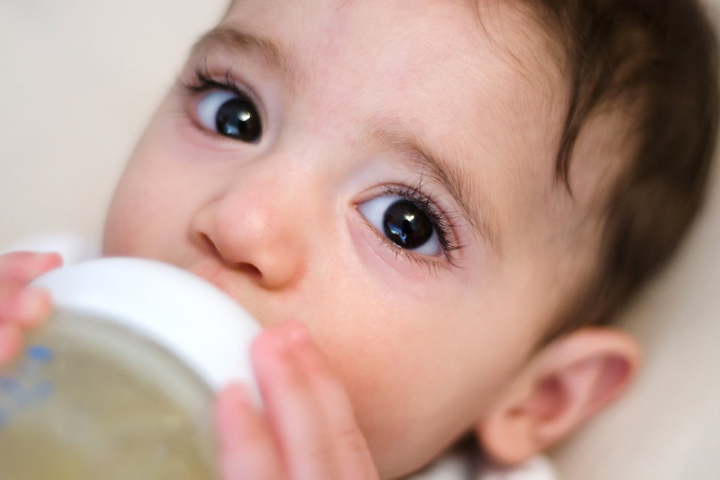 Baby Drinking from Bottle, close-up