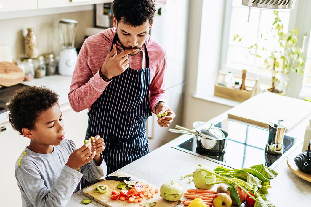 Man cooking with his son