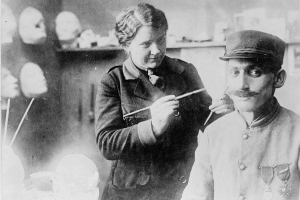 Anna Coleman Ladd in her studio with a French soldier