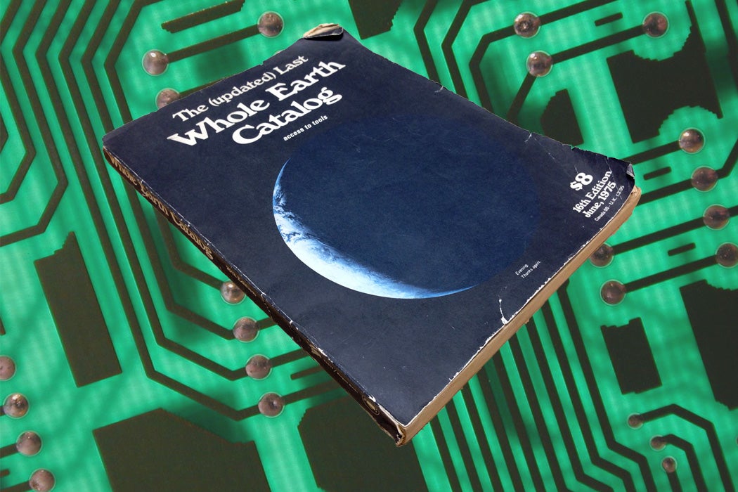 A copy of The Whole Earth Catalog hovering over a circuit board