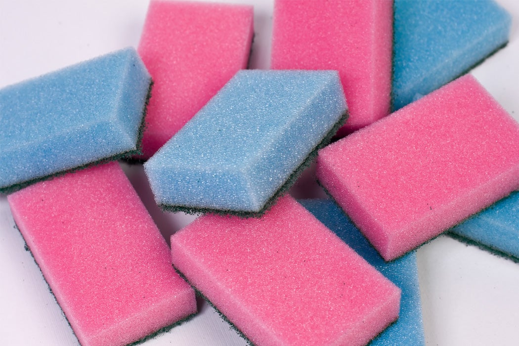 A pile of pink and blue sponges