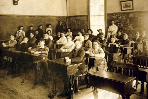 A classroom of white students in the 19th century