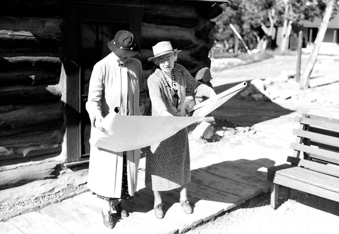 Mary colter (R) Showing blueprint to mrs ickes (Wife of secretary of interior) Circa 1935