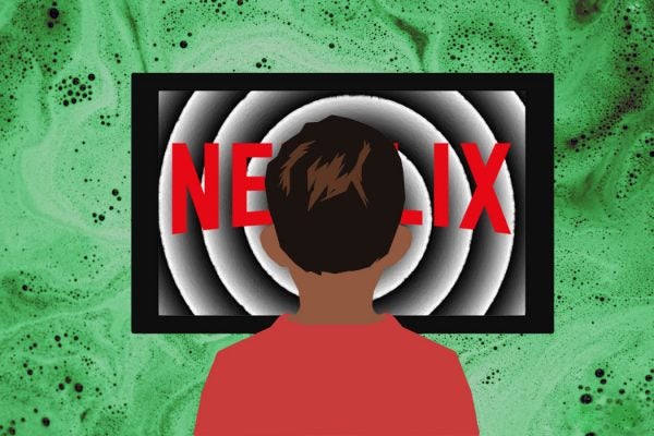 A child in front of an ominous Netflix television screen.