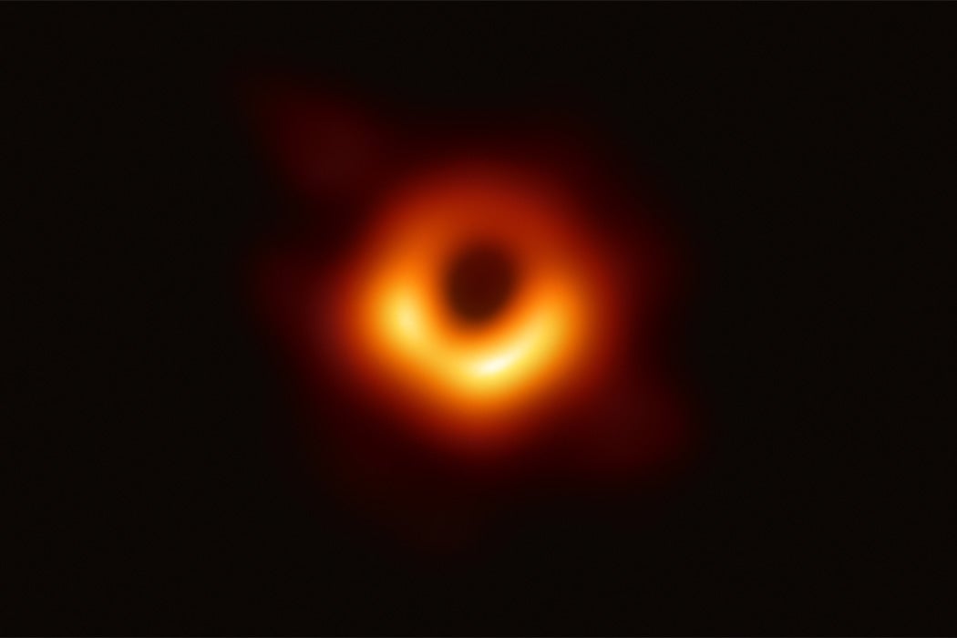 First image of a black hole by the Event Horizon Telescope. The object M87* is located at the heart of distant galaxy Messier 87.