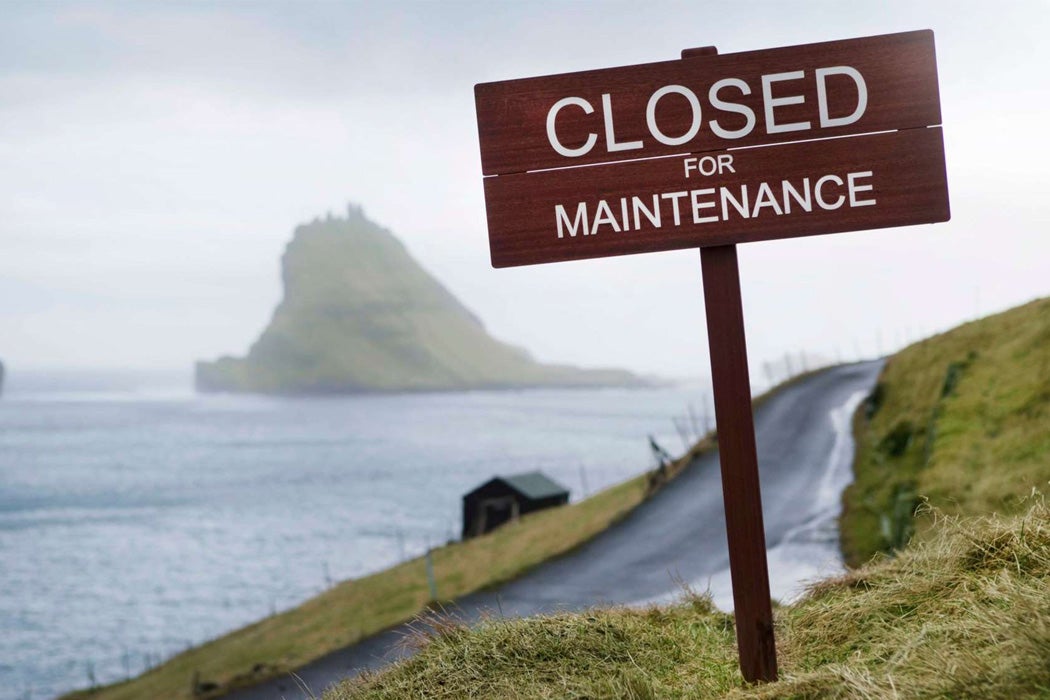 Signage reading, Closed for Maintenance, on the side of an island road