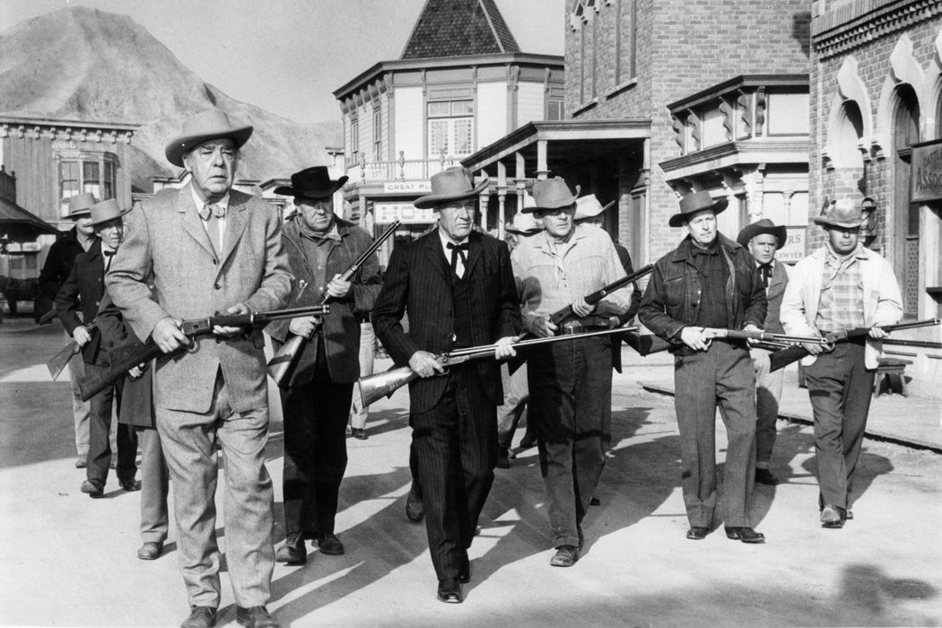 Lon Chaney and Richard Arlen lead vigilante committee in a scene from the film 'The Town Tamer', 1965.
