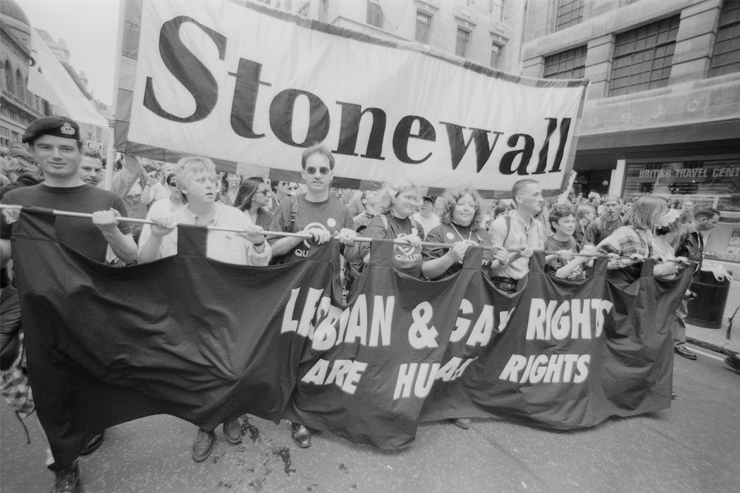 Protestors from lesbian, gay and bisexual rights charity Stonewall, carrying a banner reading 'Lesbian & Gay Rights are Human Rights' during the Gay Pride parade in London, England, United Kingdom, 6 July 1996