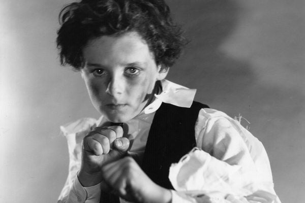 Freddie Bartholomew (1924 - 1992) in fighting stance as Little Lord Fauntleroy