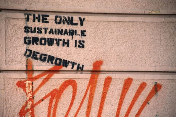 Graffiti that says "The Only Sustainable Growth is Degrowth"