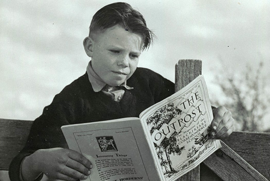 A student reading a correspondence school magazine, 1946