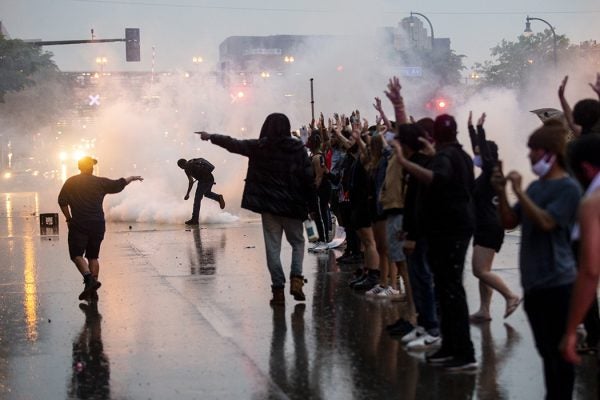 ear gas is fired at protesters demonstrating against the death of George Floyd outside the 3rd Precinct Police Precinct on May 26, 2020 in Minneapolis, MN.
