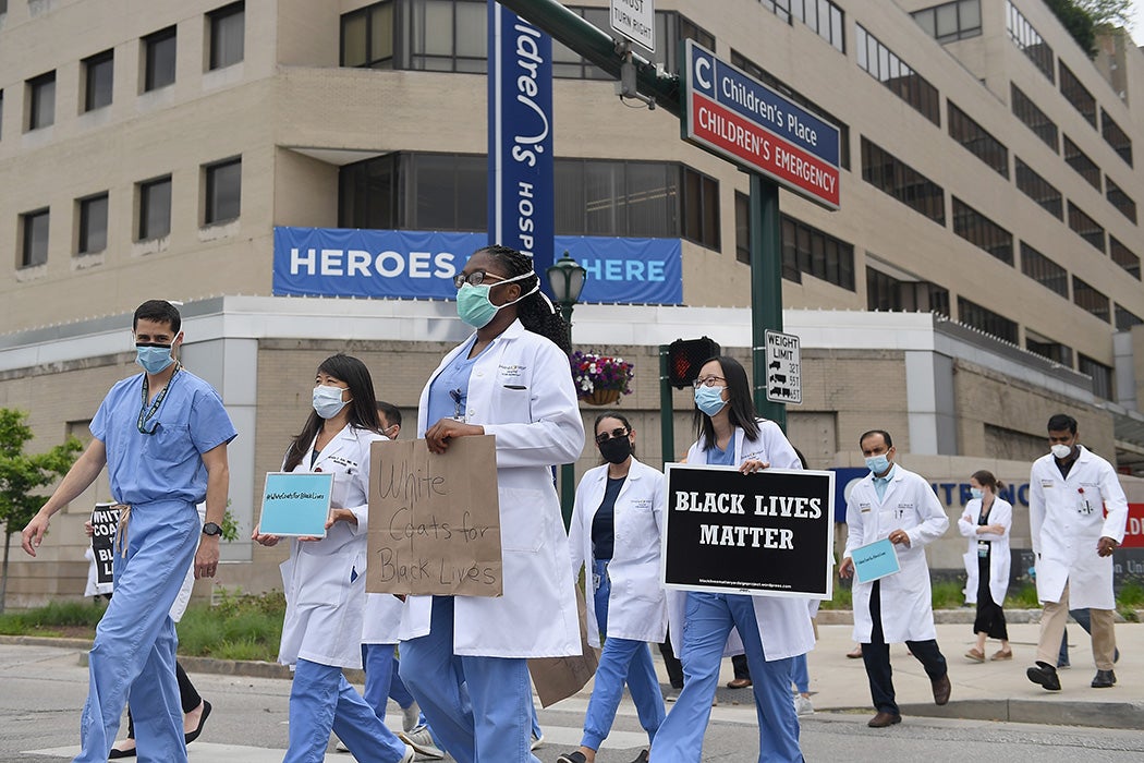 Several hundred doctors, nurses and medical professionals come together to protest against police brutality and the death of George Floyd on June 5, 2020 in St Louis, Missouri.