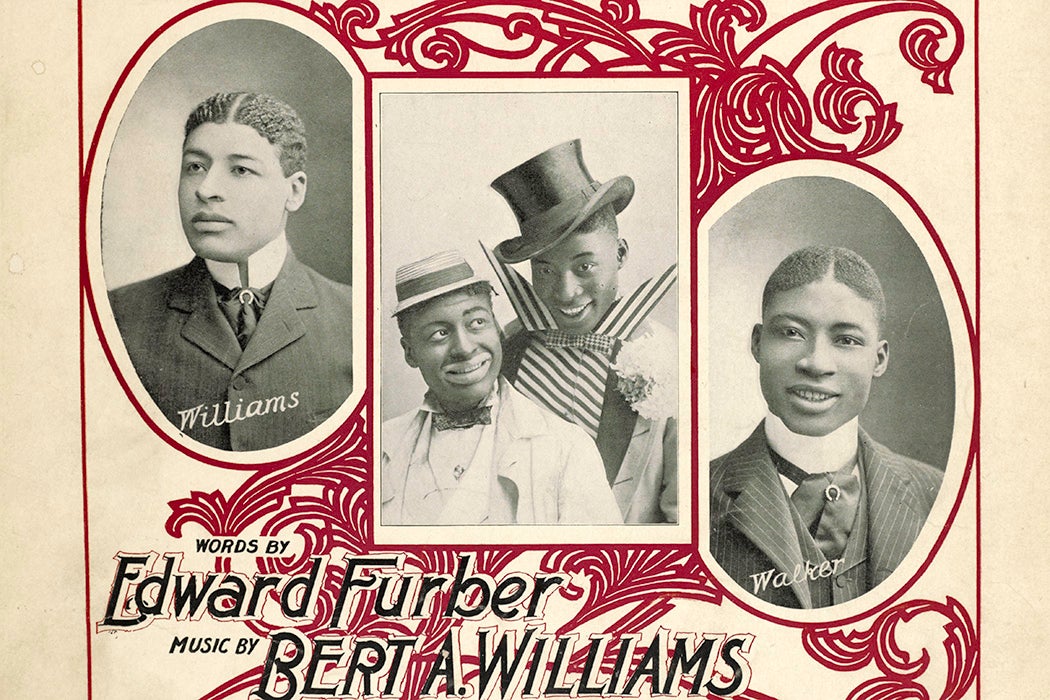 The cover of a music book for the musical "He's Up Against The Real Thing Now," starring Bert Williams and George Walker, 1898