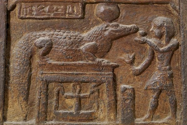 A chest depicting a king making an offering to the crocodile-god Sobek