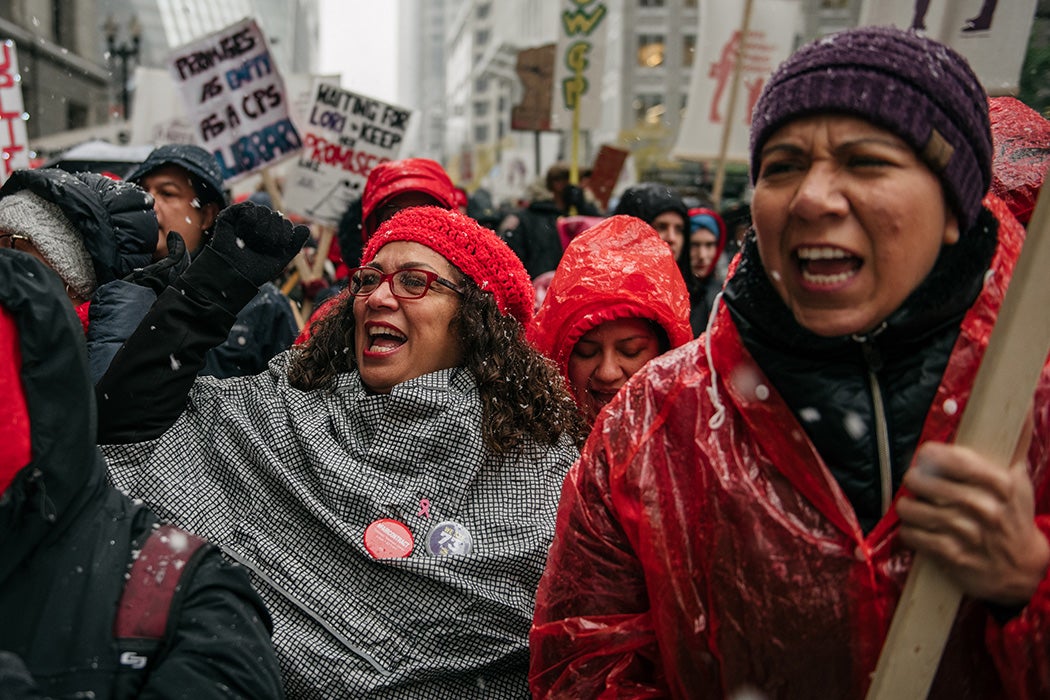 Photograph: Thousands march through the streets near City Hall during the 11th day of an ongoing teachers strike on October 31, 2019 in Chicago, Illinois. 

Source: Getty