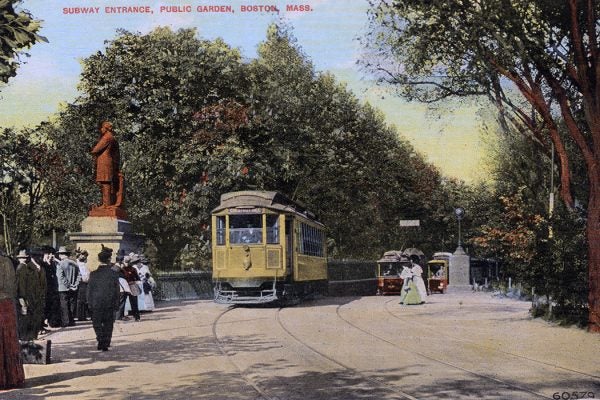 A postcard showing three trolleys at the Public Gardens Portal in Boston sometime before 1914